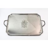 A George III style rectangular silver two handled tea tray, Sebastian Garrard, London 1913,