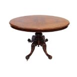 A Victorian figured walnut loo table, circa 1860,