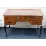 A reproduction early 18th century style walnut cross and feather banded desk, circa 1900,