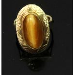 A modern tiger's eye single stone ring,