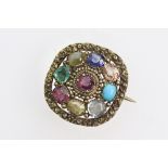 An early 19th century gold and multi-gem oblong brooch, circa 1830,