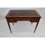 A late Victorian rosewood ebonised and inlaid writing table,