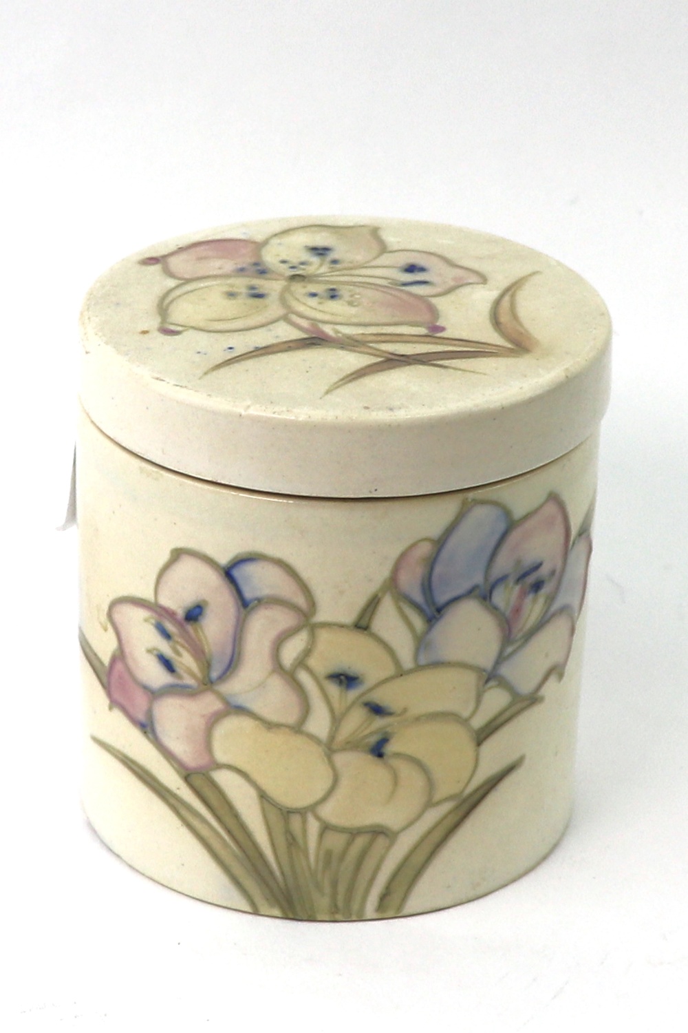 A William Moorcroft stoneware jar and cover, decorated with flowers,