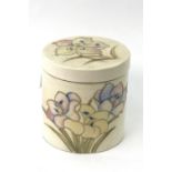 A William Moorcroft stoneware jar and cover, decorated with flowers,