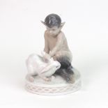 A Royal Copenhagen figure, Faun with rabbit, no. 439.