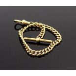 An early 20th century 18ct gold curb link short watch chain,with a 'T' bar and swivel terminals,