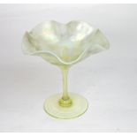 A Loetz style iridescent shaded green glass sweetmeat stand, with crimped flared sides,