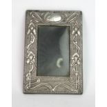 An Art Nouveau silver mounted rectangular photograph frame, Chester 1906, makers mark unclear,