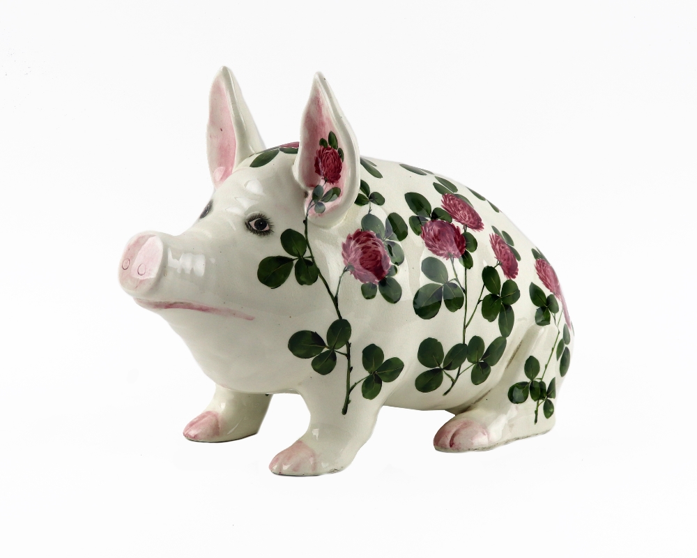 A large Plichta 'Clover' pattern pig, profusely painted with clover flower heads and foliage,