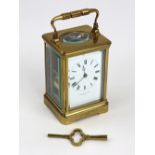 A French brass cased carriage clock, retailed by Hamilton & Inches, Paris, early 20th century,