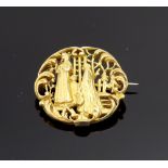 A 19th century gold round brooch, cast,