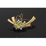 A yellow gold and gem set abstract 'spray' brooch, mid 20th century,