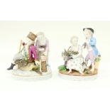 A pair of German porcelain figure groups, in Meissen style, late 19th century,