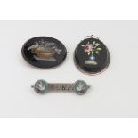 A 19th century oval micro mosaic brooch, depicting the Doves of Pliny (af),