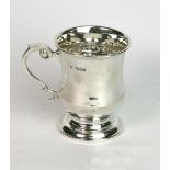 A George V silver christening mug, Robert Reid, Sheffield 1922, of baluster shape, faceted below,