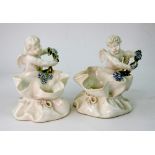 A pair of Moore Brothers porcelain posy baskets, retailed by Thomas Goode & Co London,