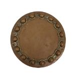 A 19th century copper circular base plate, border mould,