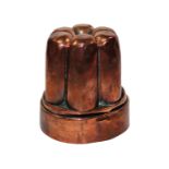 A Victorian circular copper jelly mould by Benham & Froud, no.