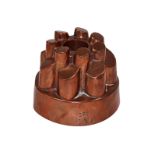 A Victorian copper circular tiered jelly mould, no.