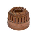 A Victorian circular shape jelly mould, rope twist domed tops,