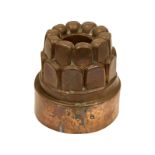 A Victorian copper circular tiered jelly mould, by Benham & Froud, no.