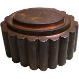 A Victorian oval copper large jelly mould, with fluted tapering sides and stepped top, unmarked,
