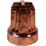 An Alexandra Cross copper jelly mould, circa 1863, of stepped cross outline on a circular base,