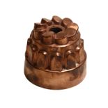 A French copper circular tiered jelly mould, 51, upper crown of slant top flutes,