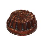 A 19th century handmade copper, circular shaped jelly mould,