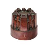 A Victorian circular copper jelly mould by Benham & Froud, no.