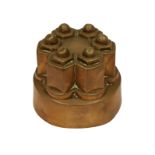 A Victorian copper circular shaped jelly mould, with six hexagonal turrets on plain circular base,