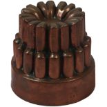 A Victorian circular copper jelly mould by Benham & Froud, no. 489, of two fluted tiers, 10.