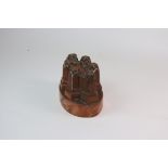 A Victorian copper and oval shaped jelly mould no.