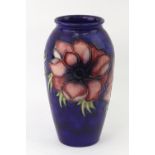 A William Moorcroft 'Anemone' pattern baluster vase, signed in green 'W M',