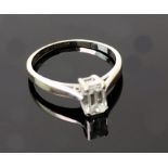 An 18ct white gold and baguette cut diam