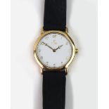 Titan: A lady's gold wristwatch, with c