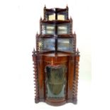 A Victorian rosewood four tier corner wh