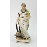 A pearl glazed earthenware figure, an al