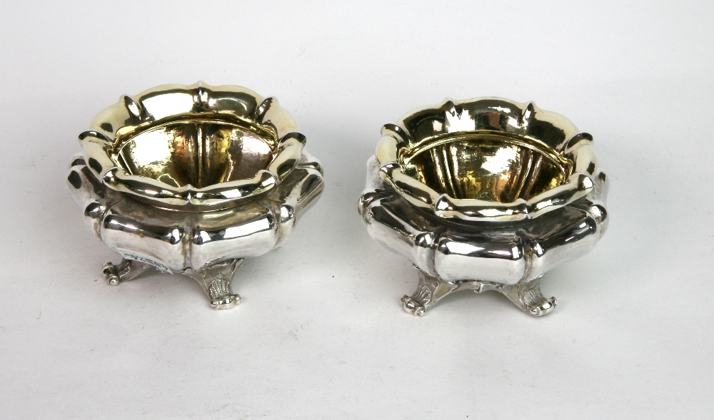 A pair of William IV silver melon patter