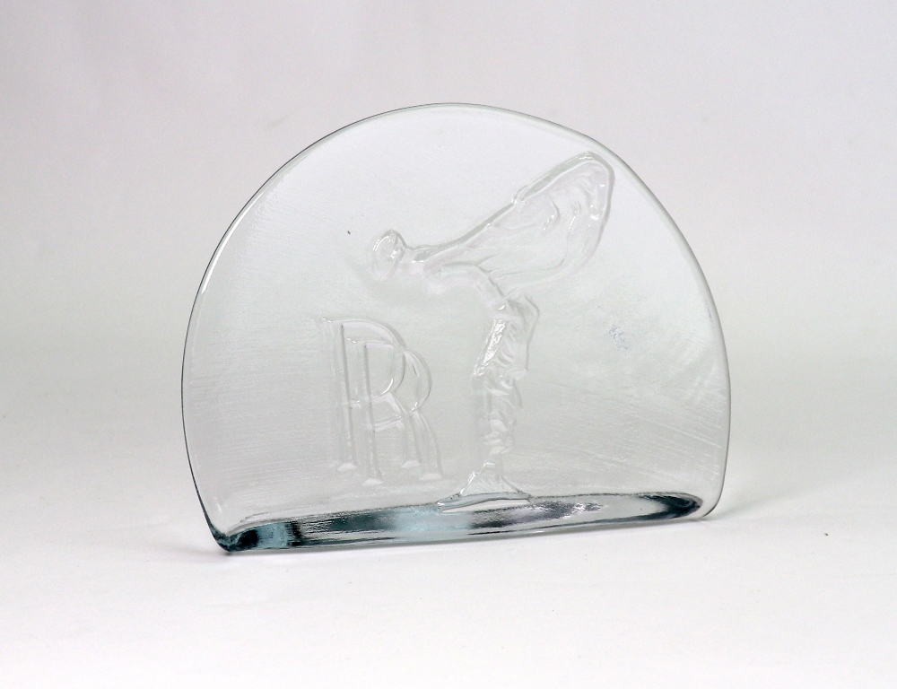 A Rolls Royce glass desk plaque, decorat