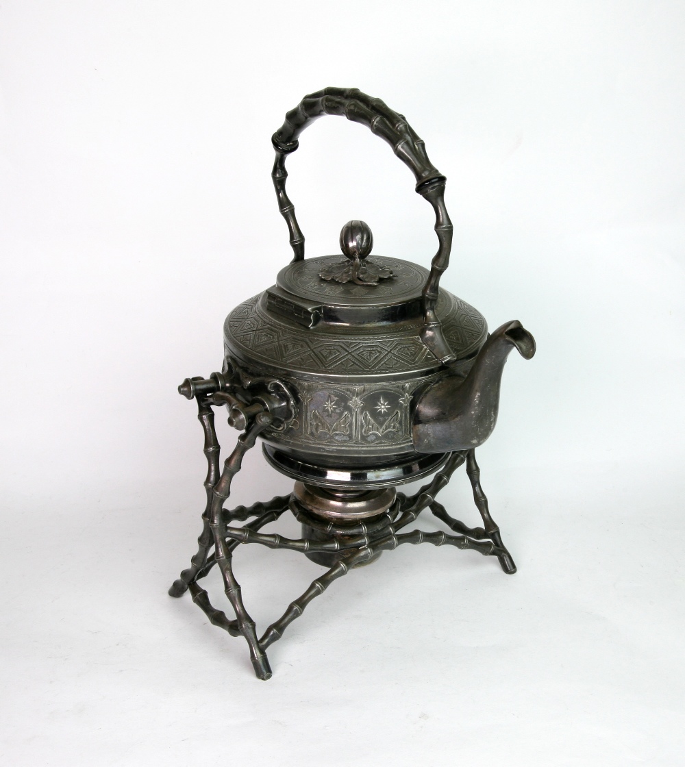 A Victorian Britannia metal tea kettle,