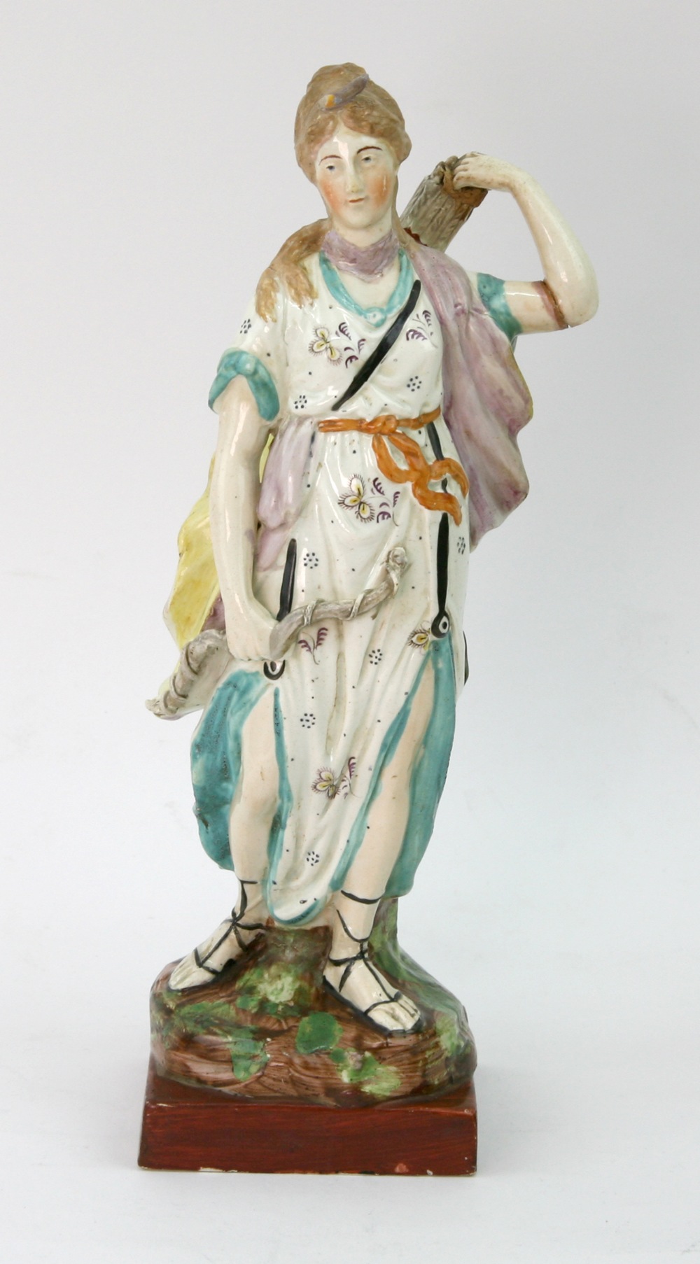 A pearl glazed earthenware figure of Dia