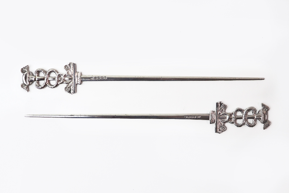 A pair of early Victorian silver meat sk