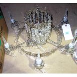 A 20th century silvered metal and glass two tier chandelier.