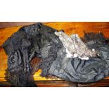 Clothing; a quantity of late 19th/20th century clothing including a black lace shawl, a garter,