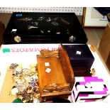 Costume jewellery including; boxed watches, necklaces, brooches, two display cases and sundry.