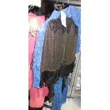 Clothing; a 19th century lady's black beadwork and lace evening shawl,