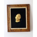 A gilt metal bust in profile of a gentleman, 19th Century, 14cm,