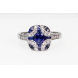 A modern 18ct white gold, sapphire and diamond panel ring,