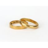 Two 22ct gold wedding bands, one with an internal inscription 'Bear Yea One Anothers Burdens', 5.